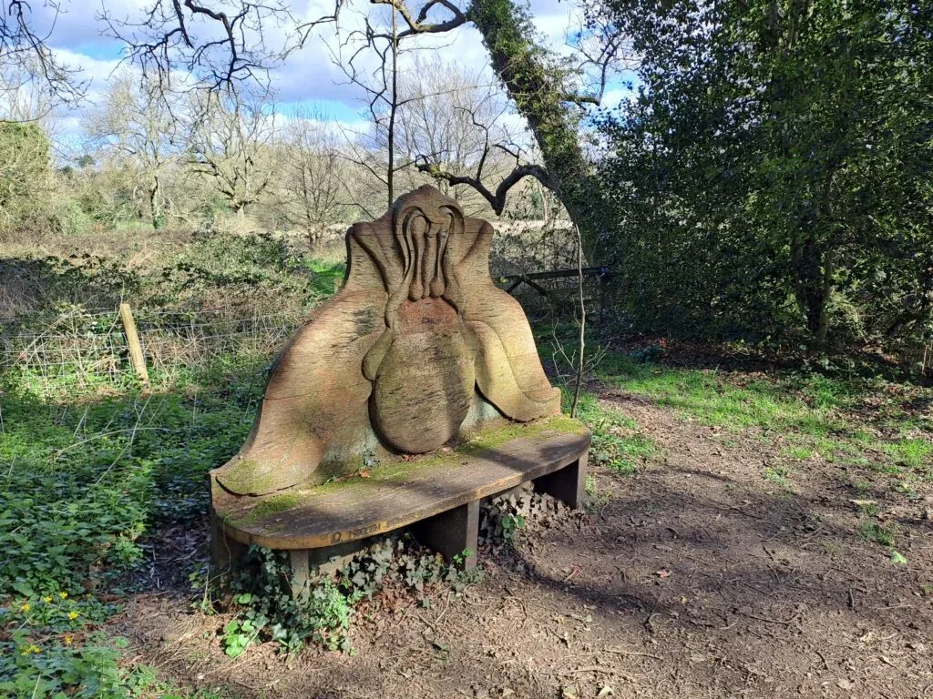 Carved wooden bench on the North Downs Way