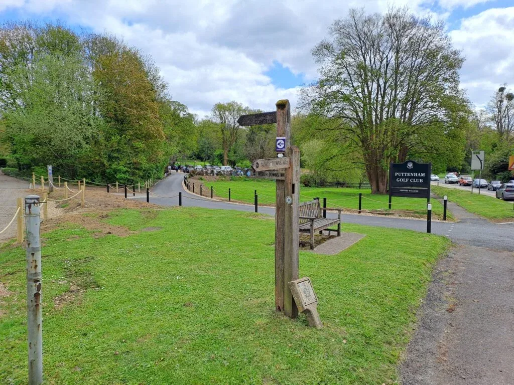 North Downs Way signpost next to Puttenham Golf Club