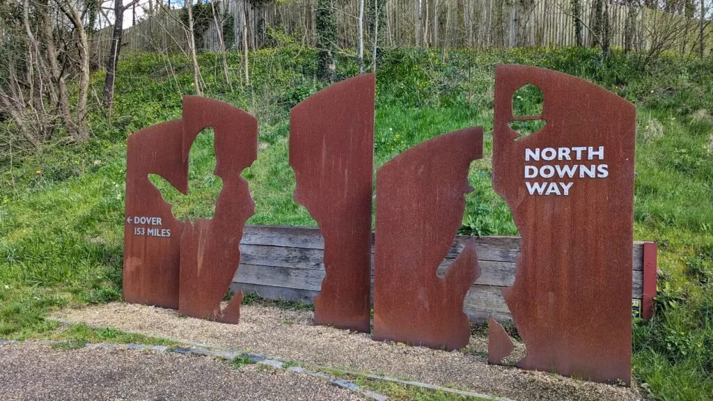 Metal North Downs Way starting sign in Farnham