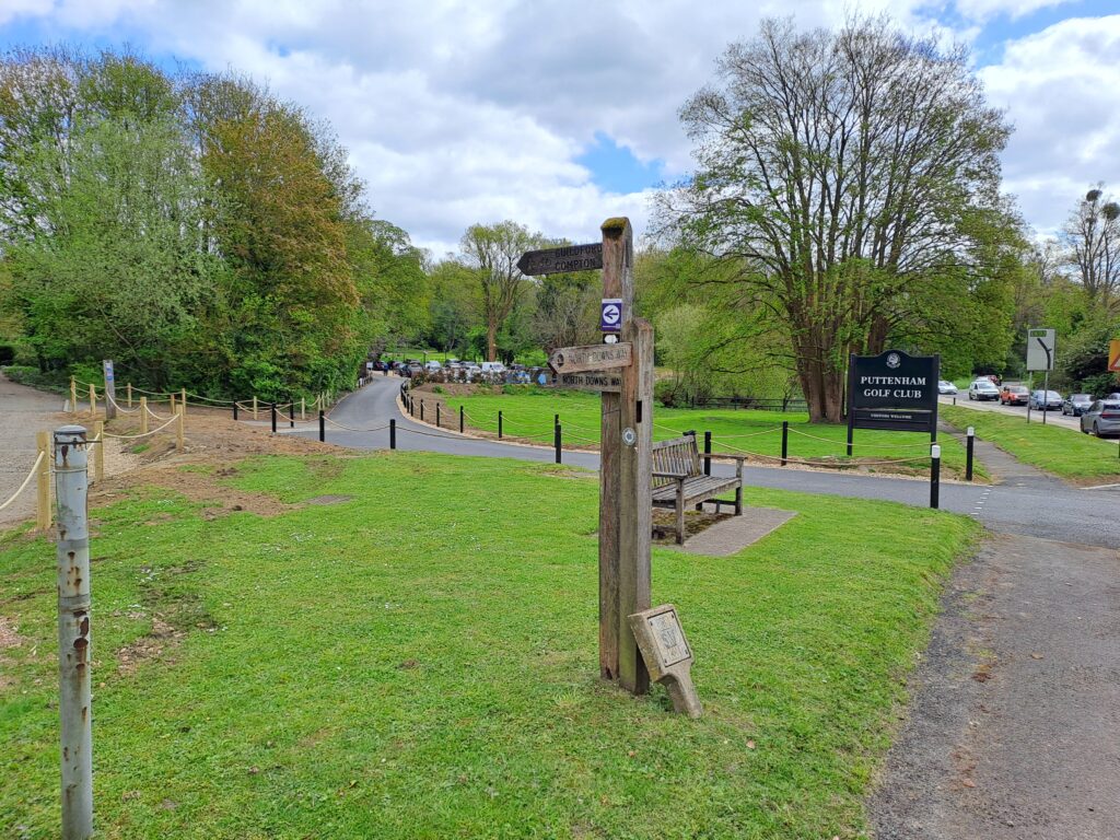 the north downs way walking from Farnham to Guildford signpost just outside Puttenham