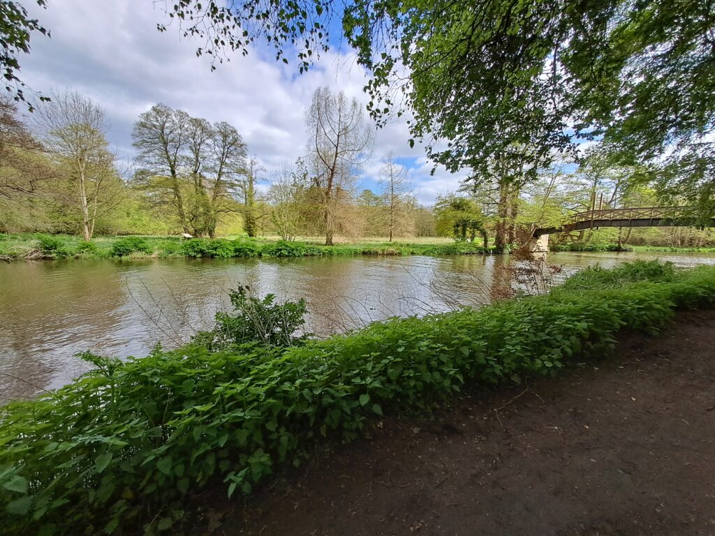 the north downs way walking from Farnham to Guildford view of the River Wey